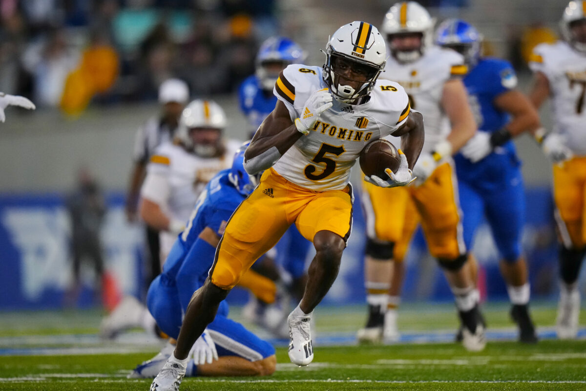 HOOKED ‘EM: Wyoming transfer WR Isaiah Neyor signs with Texas