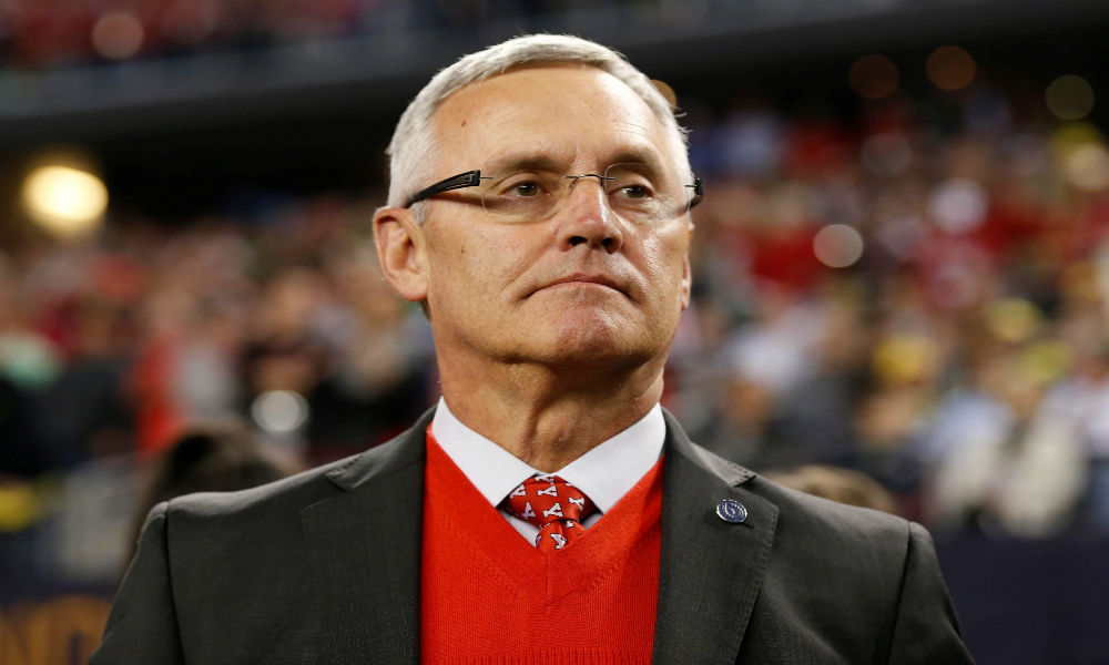 Former Ohio State coach Jim Tressel rates the job Jim Harbaugh has done at Michigan