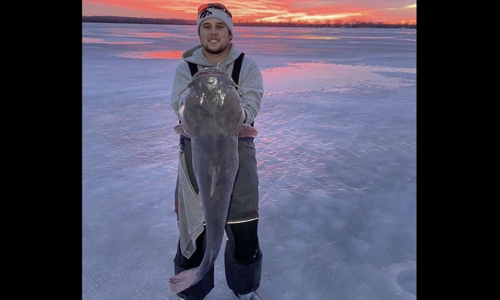 ‘Monster’ catfish reeled through ice during epic Iowa sunset