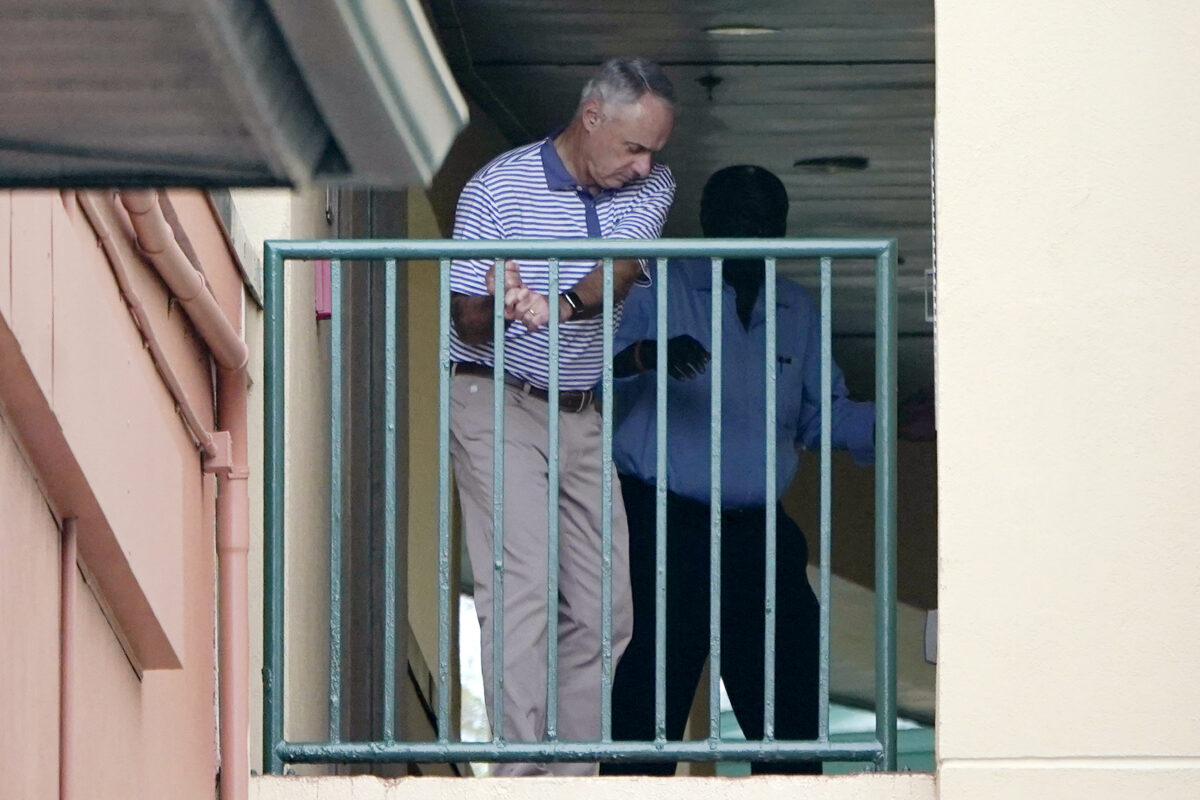 While MLB season hangs in the balance, commissioner Rob Manfred works on his backswing