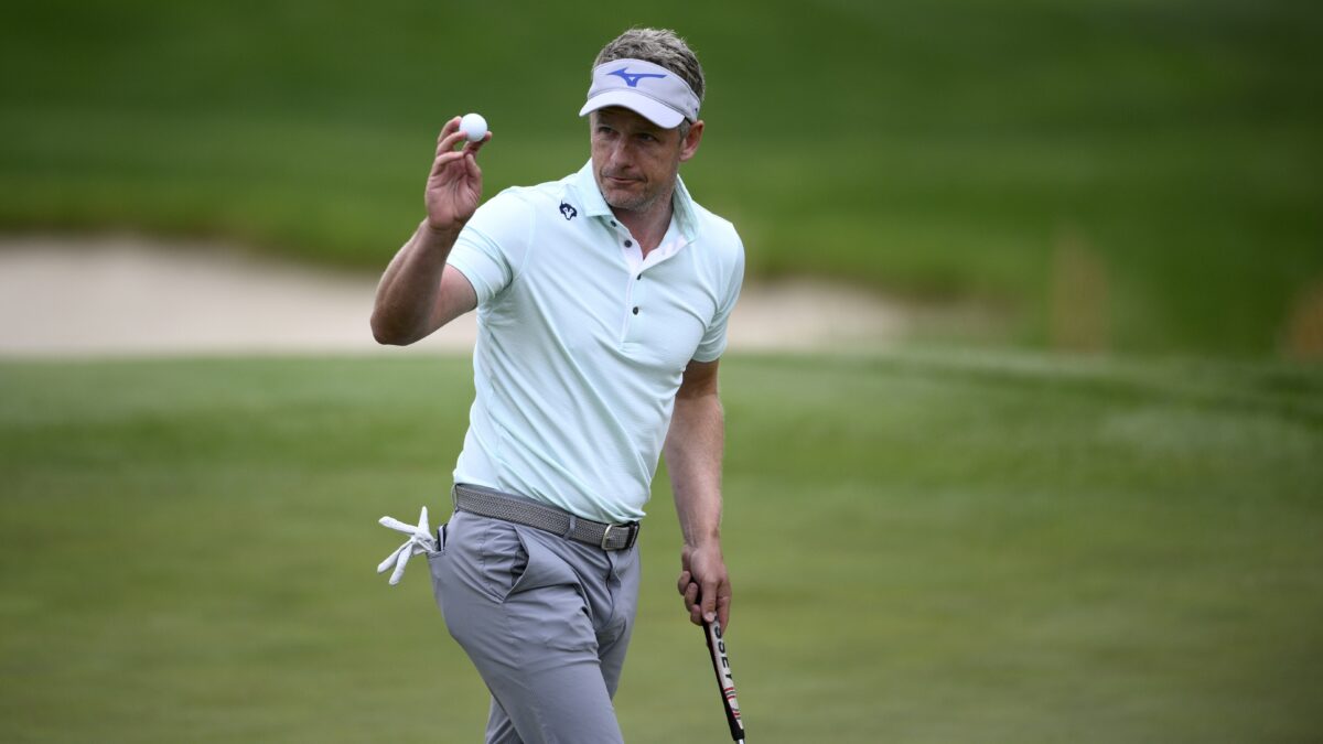 Luke Donald holes out for eagle at Wells Fargo Championship, celebrates with fans in the rain