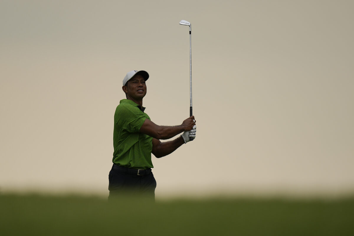 A gutsy Friday performance leads Tiger Woods to weekend appearance at 104th PGA Championship