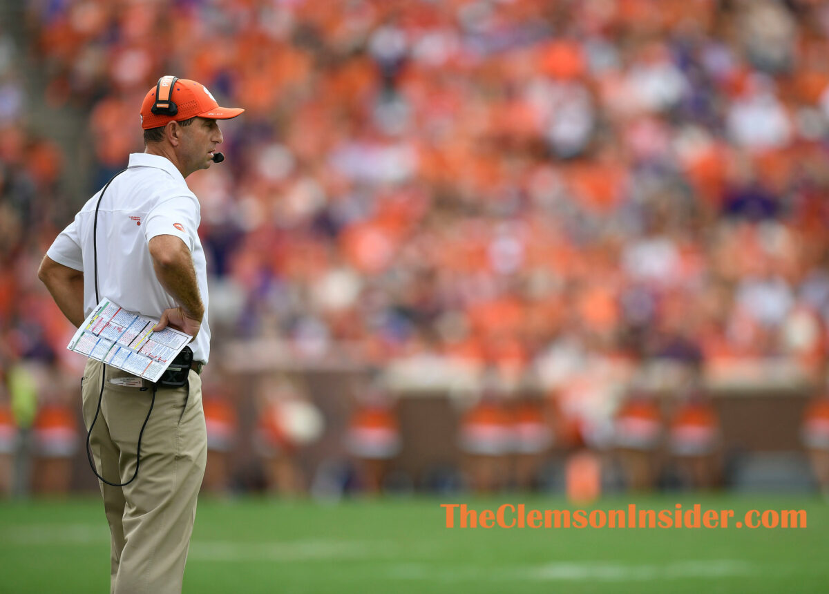 What did Swinney say about the ACC considering elimination of divisions?