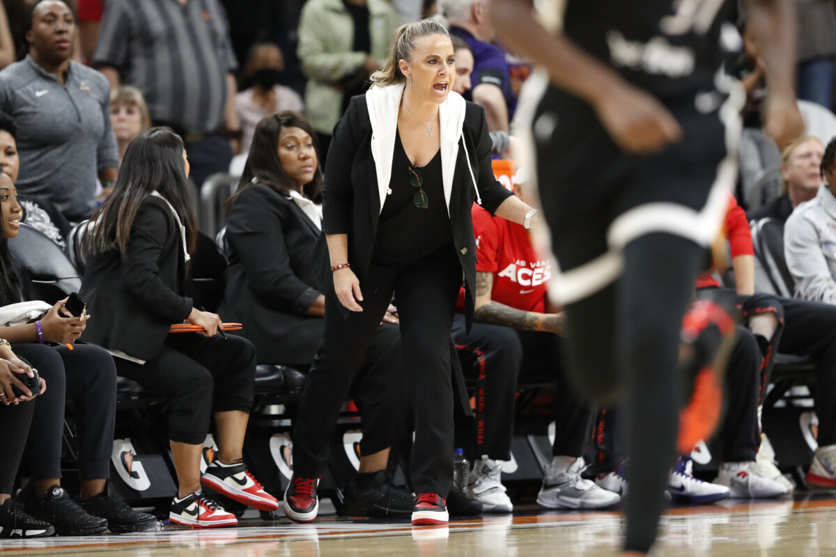 The Las Vegas Aces doused Becky Hammon with water bottles after she made history with her first WNBA coaching win