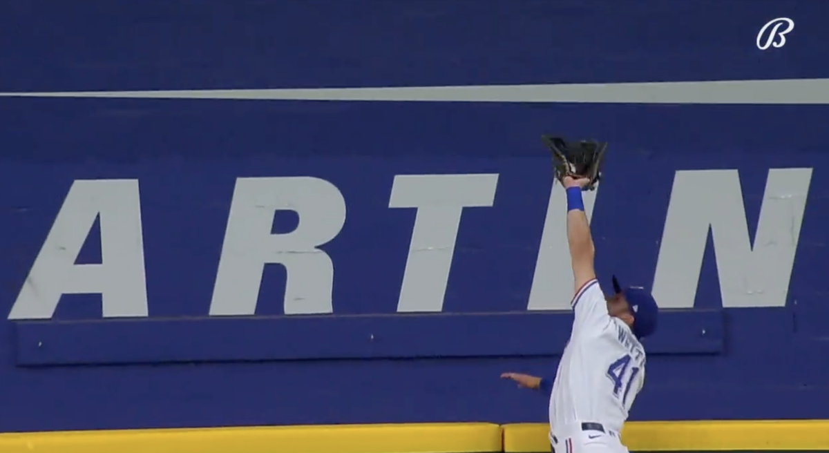 Rangers’ Eli White robbed the Rays of a home run on a sensational leaping catch