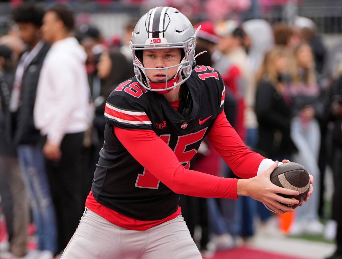 LOOK. Ohio State freshman quarterback Devin Brown gives nod to John Elway in photo recreation.