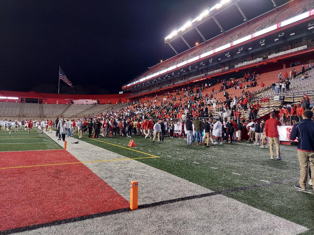 Who is visiting Rutgers football for official visits in June?