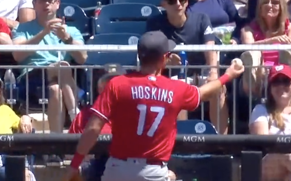 Rhys Hoskins hilariously pretended to give a Nats fan the baseball before throwing it back in play