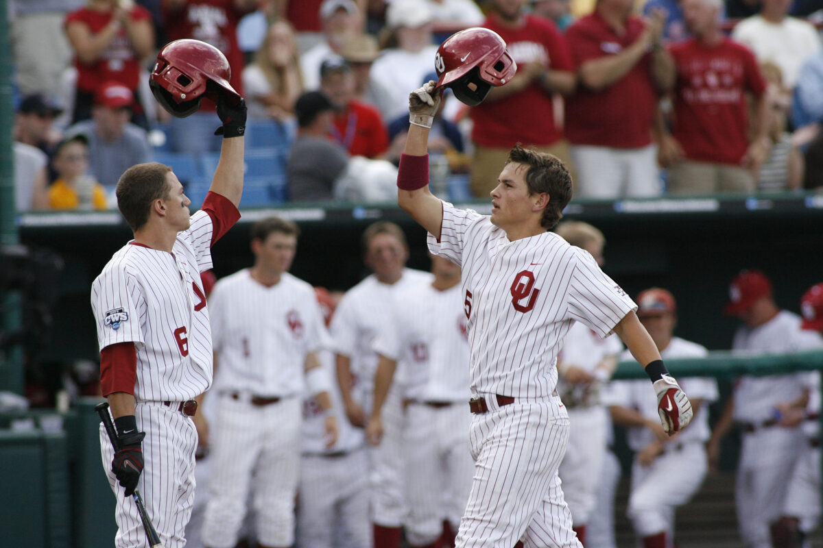 Sooners open College World Series with 13-8 win over Texas A&M