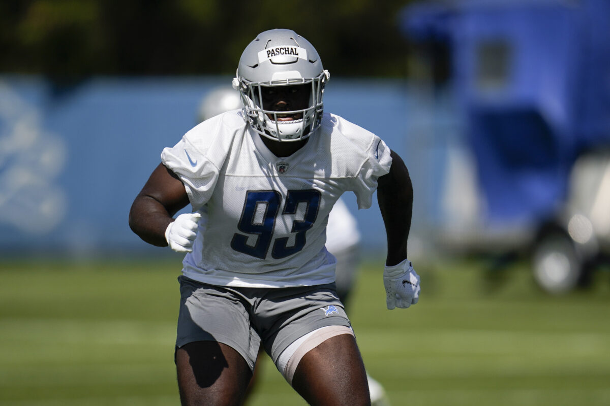 Josh Paschal signs his rookie contract with the Lions