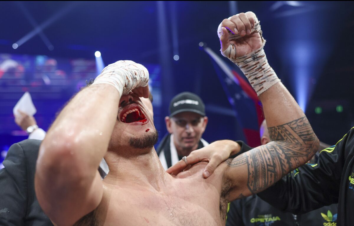 Photos: Jai Opetaia wins 200-pound title in wild fight with Mairis Briedis