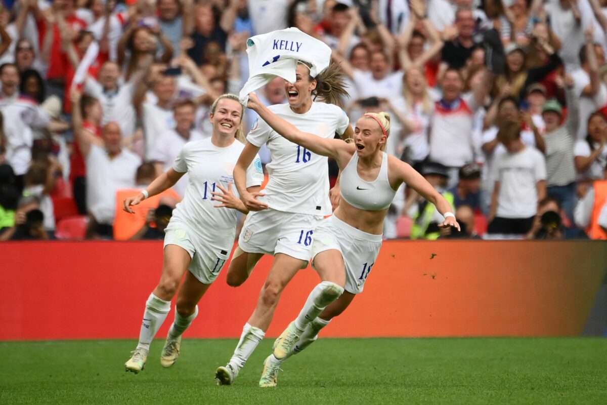 Brandi Chastain congratulates Chloe Kelly on her shirt-removing Euro 2022 winner