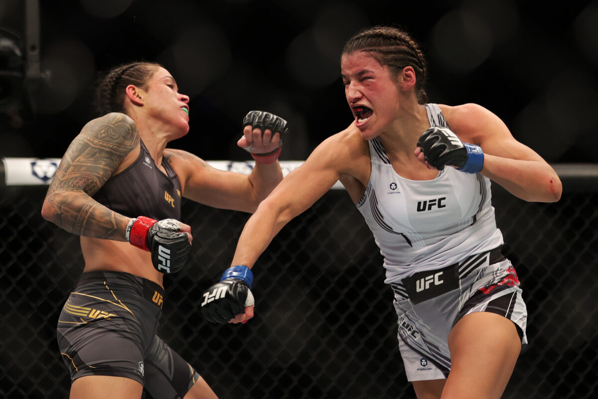 Julianna Peña def. Amanda Nunes at UFC 269: Best photos