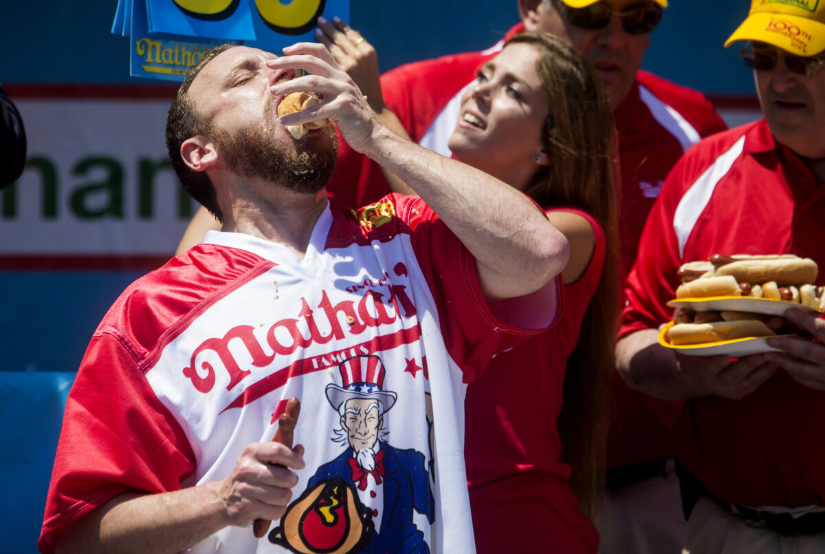 12 ridiculous photos of Joey Chestnut jamming hot dogs into his face over the years