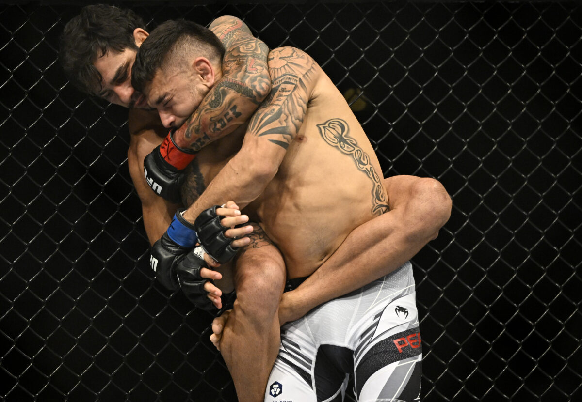 Alexandre Pantoja def. Alex Perez at UFC 277: Best photos