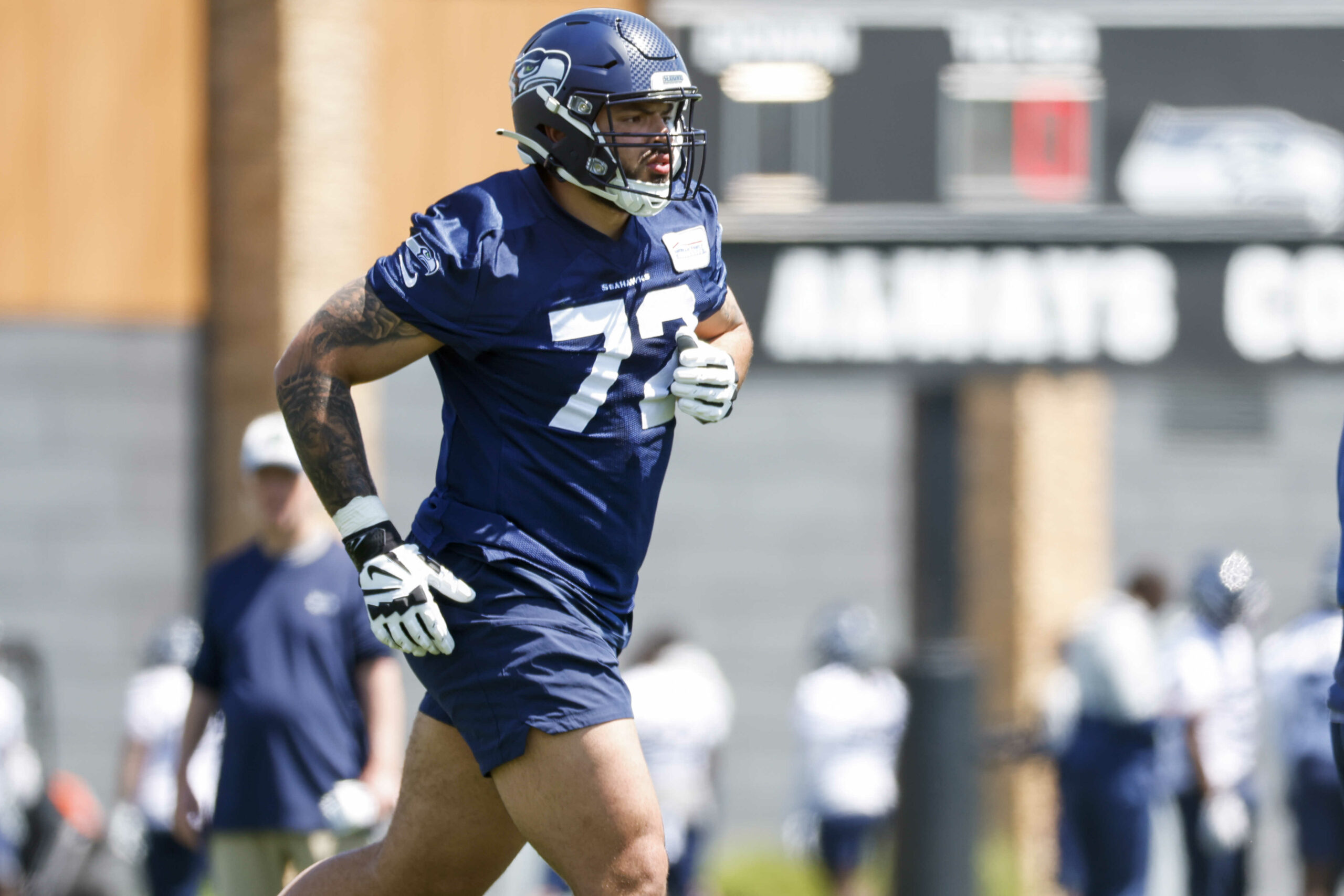 Seahawks rookies thrown into action, ‘learning at the fire line’
