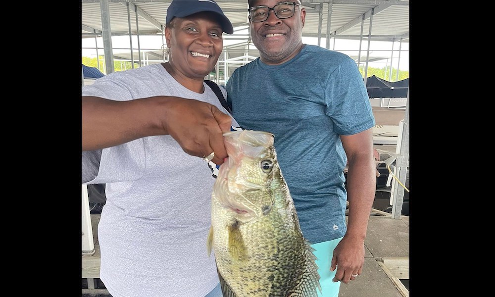 Woman lands record crappie on 35th wedding anniversary