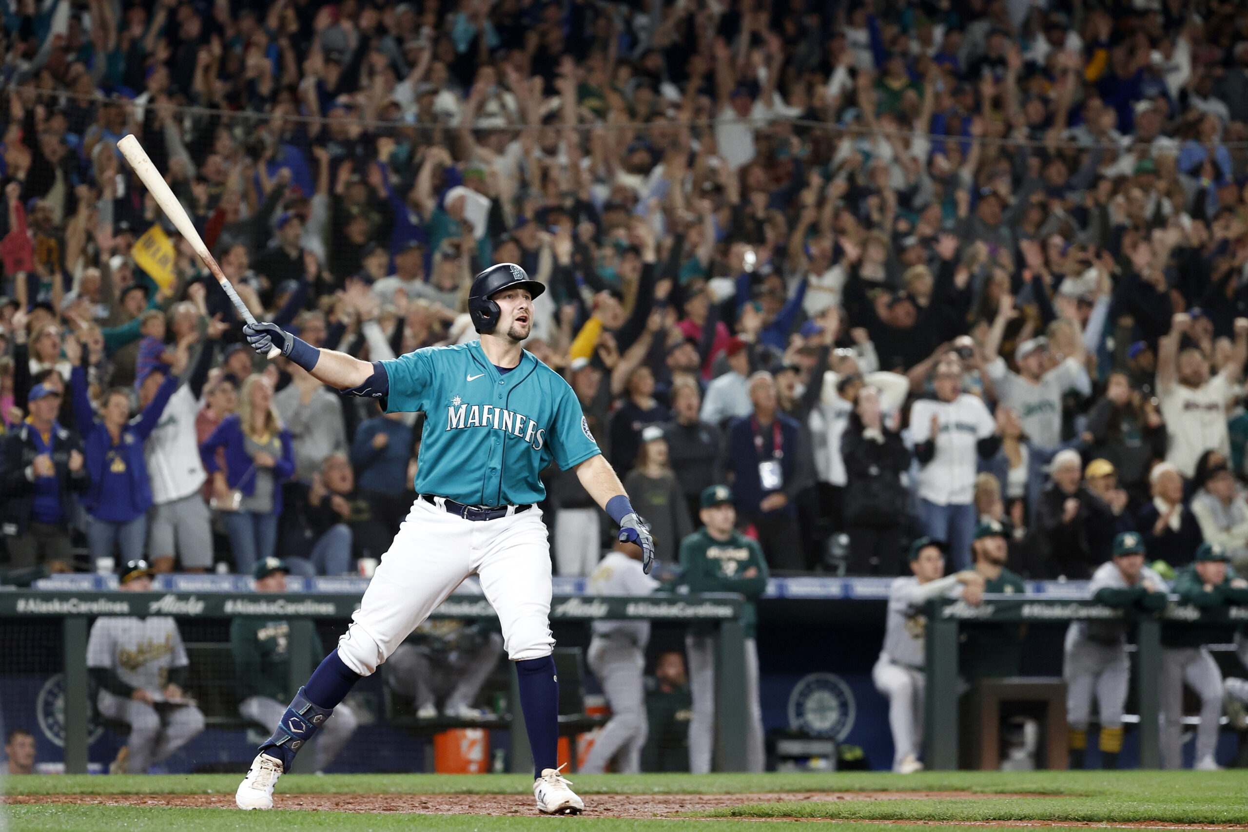 Cal Raleigh’s epic walk-off home run that sent the Seattle Mariners to the playoffs, in photos