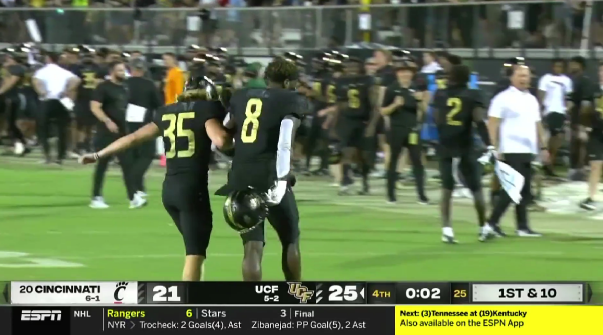 2 UCF players delightfully skipped off the field holding hands after beating Cincinnati