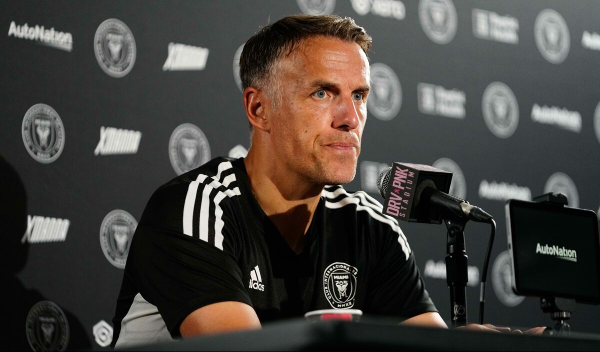 Phil Neville would really like to know where his team’s playoff game will be