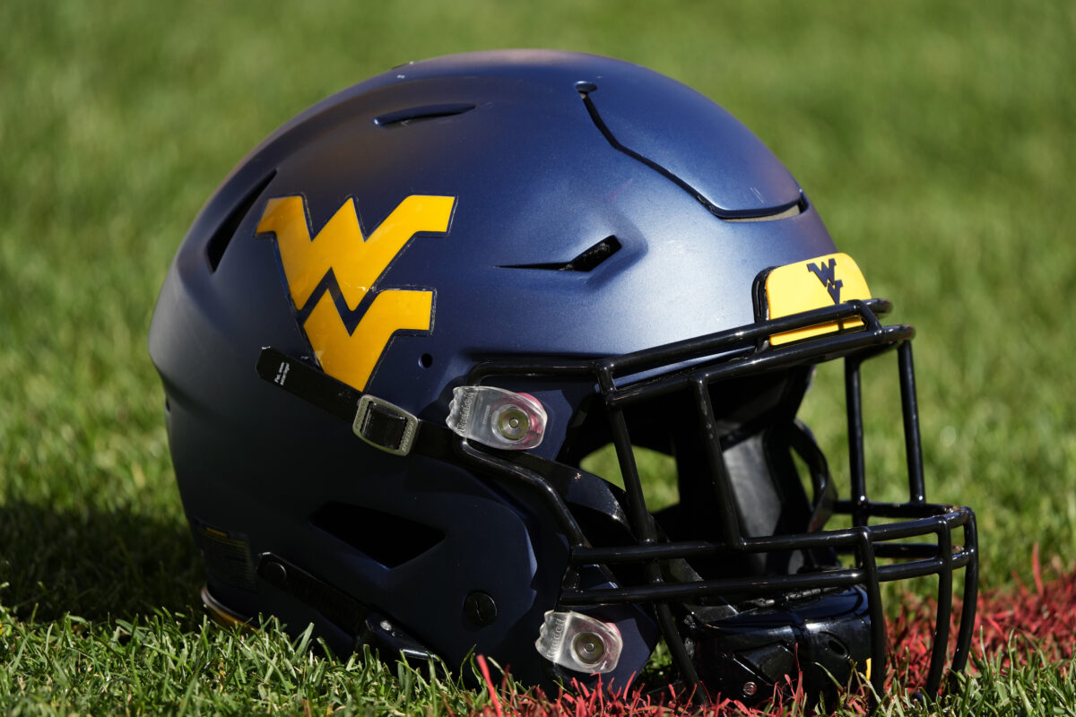 West Virginia DB celebrated disastrously a pass breakup that turned out to be a huge completion