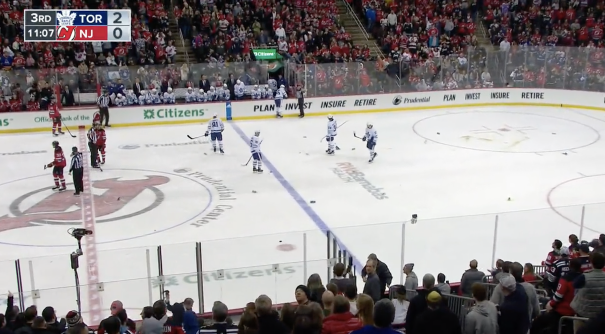 Devils fans angrily threw debris on the ice after 3 disallowed goals in a game