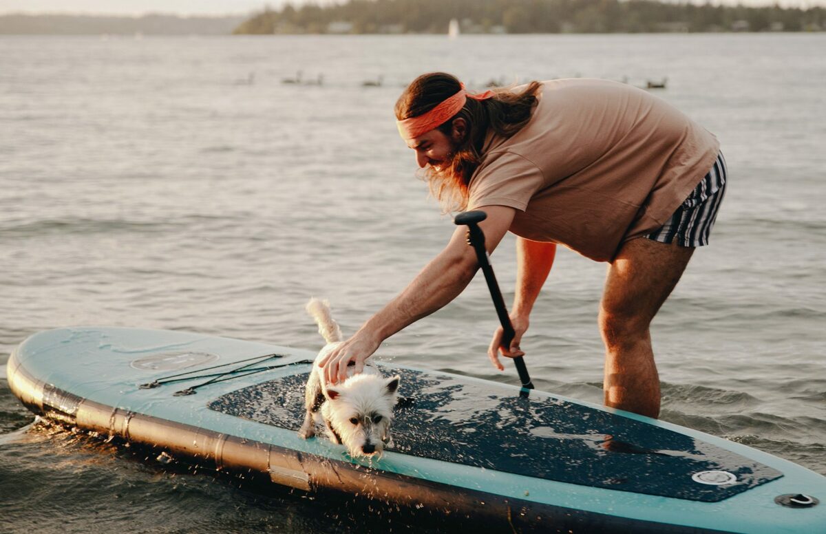 Want to SUP with your pup? These tips will help you learn to paddleboard with your dog