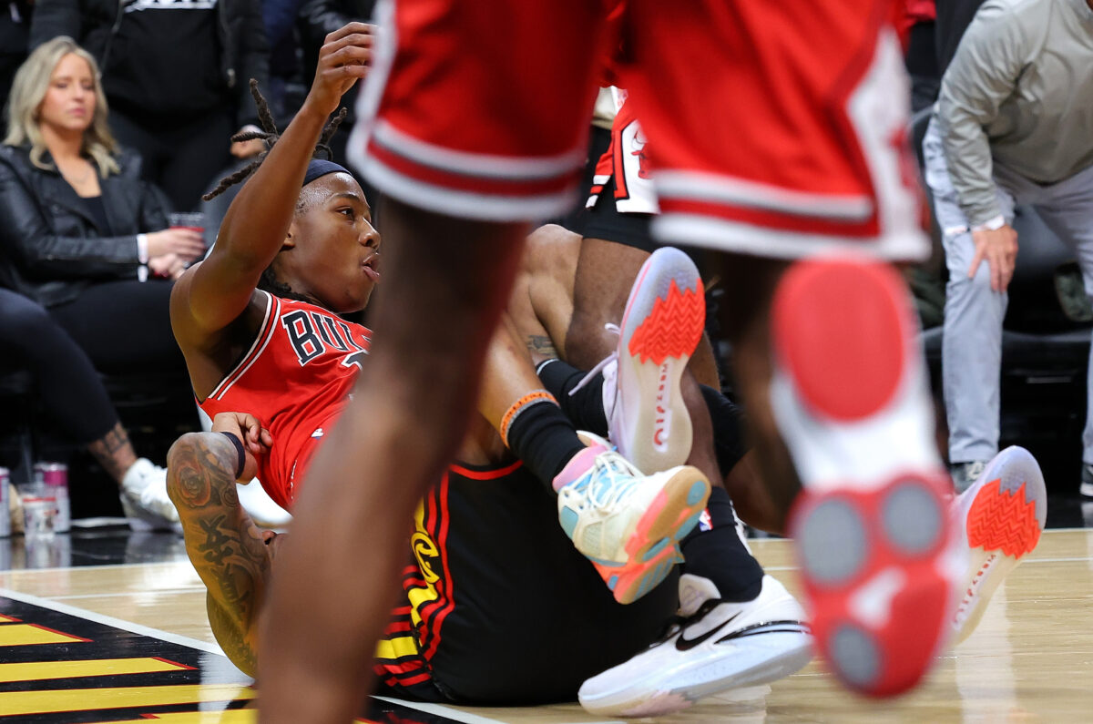 John Collins got stuck under the Bulls’ pile after Ayo Dosunmu hit a game-winner and the internet thought it was hilarious