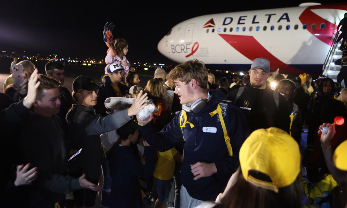 PHOTOS: Michigan football arrives for Vrbo Fiesta Bowl, College Football Playoff semifinal