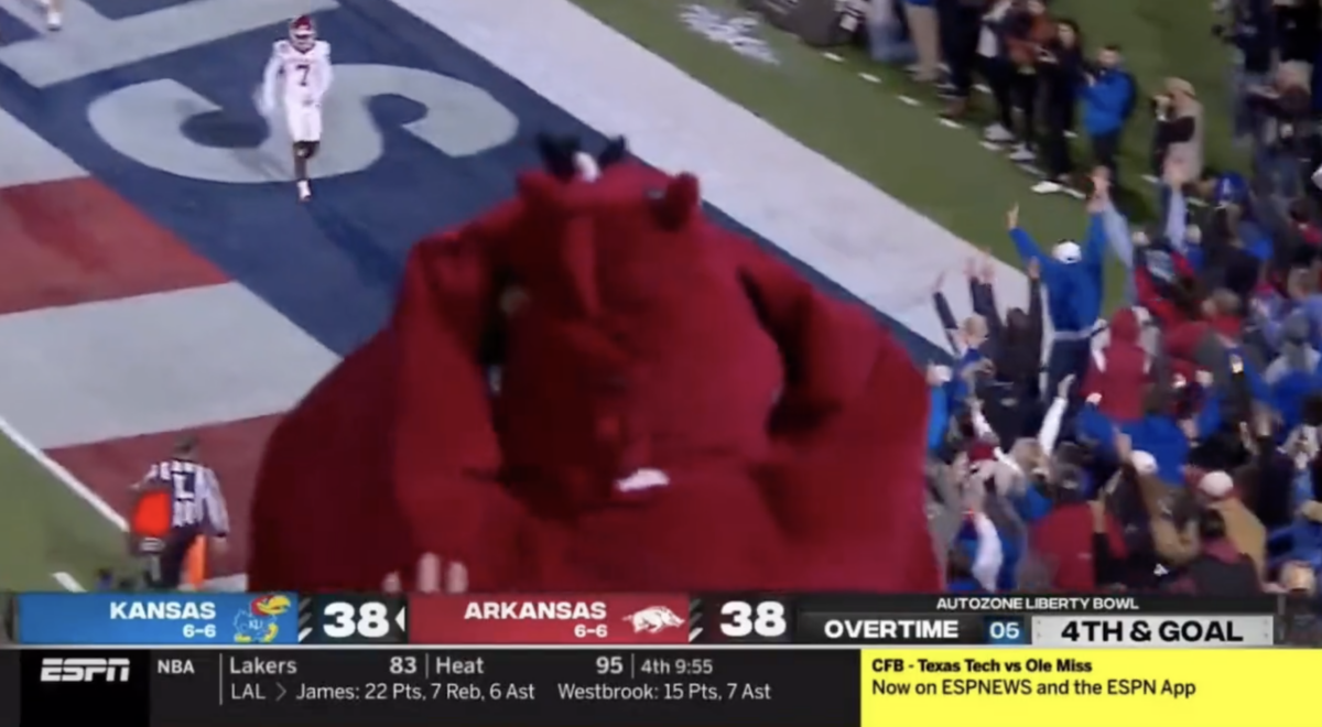 An Arkansas fan in a hog costume ruined ESPN’s shot of Kansas’ first OT touchdown