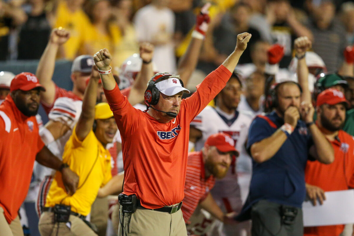 Four members of Hugh Freeze’s Liberty staff are expected to join him in Auburn
