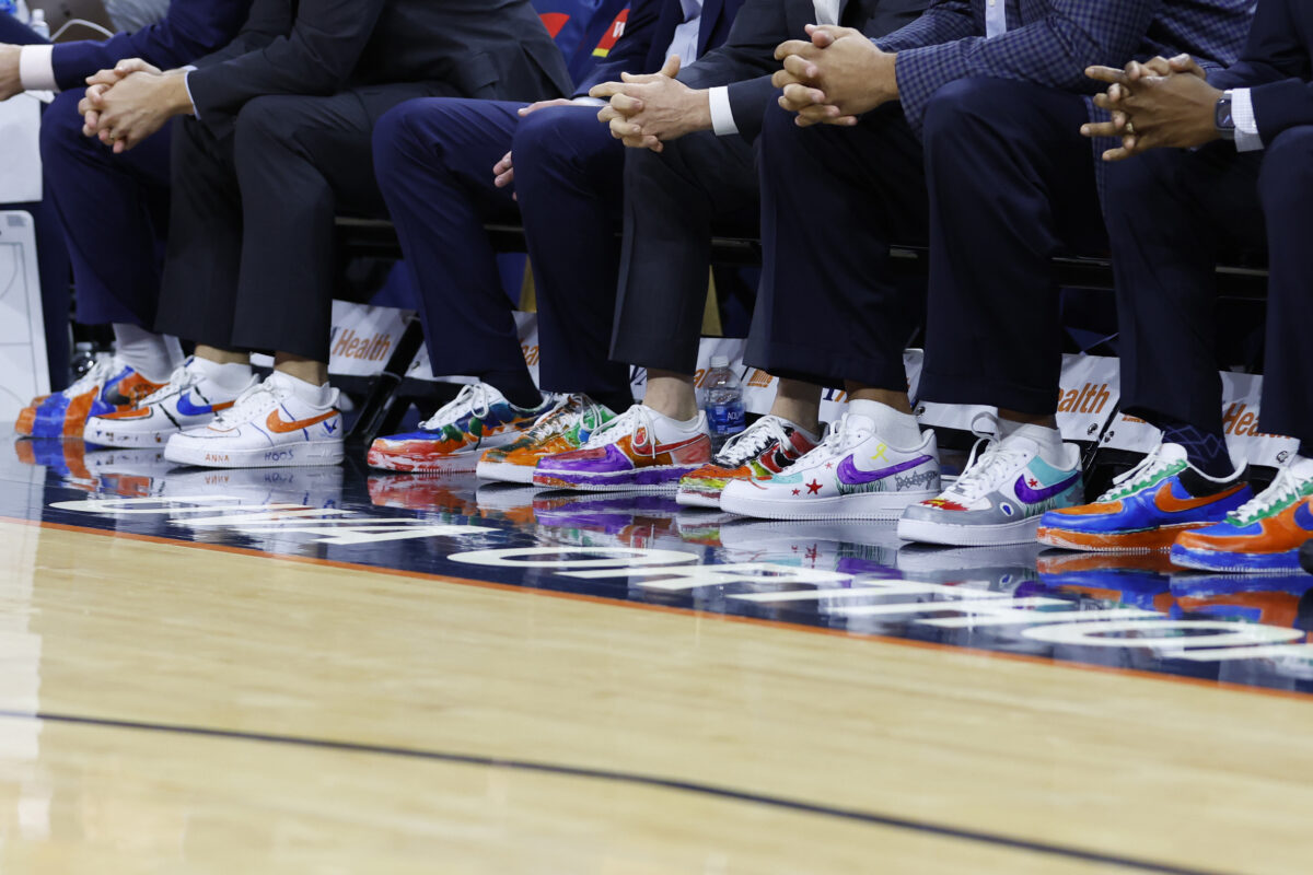 Virginia basketball coaches sport hand-painted sneakers in support of Shoes for Hope