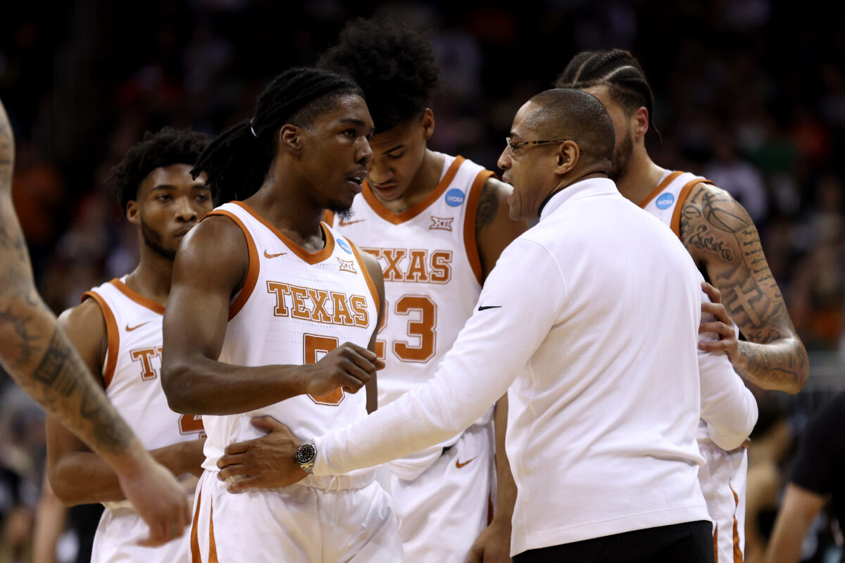 Texas interim coach Rodney Terry was moved to tears talking about how much he loved his team