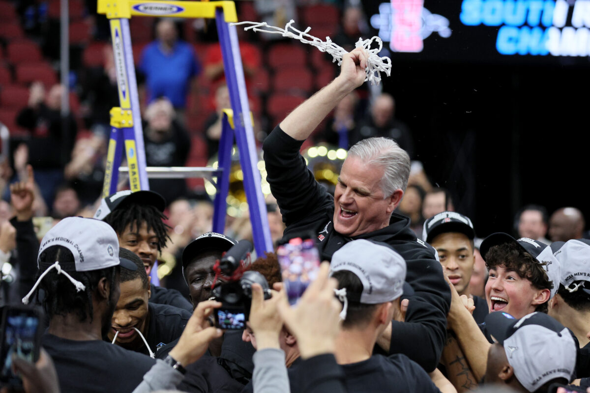 San Diego State coach Brian Dutcher did a celebratory trust fall after punching ticket to Final Four