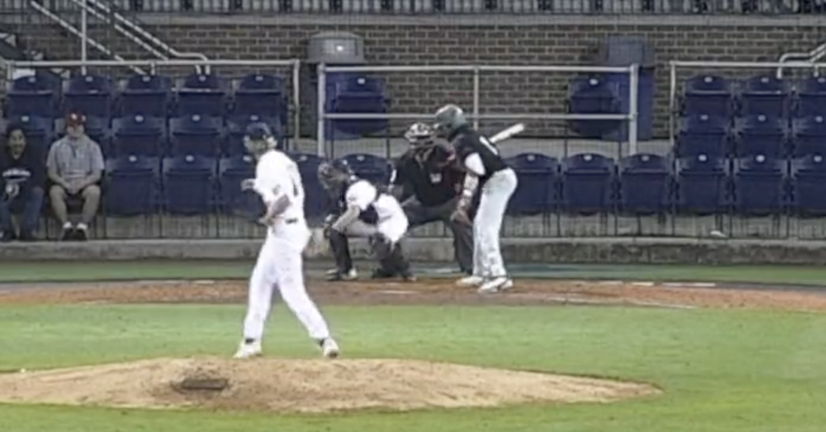 Fans were furious after a college umpire intentionally made a horrendous strikeout call as retaliation