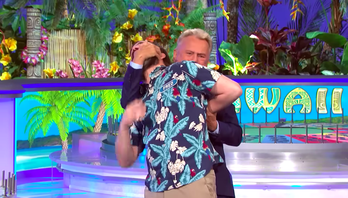 Pat Sajak celebrated a pro wrestler’s Wheel of Fortune win by jokingly tapping him out