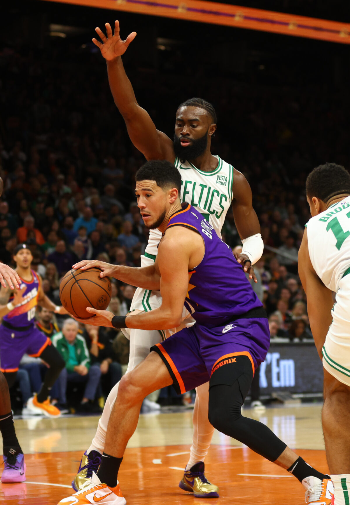 Are the Phoenix Suns or Boston Celtics more likely to win the 2023 NBA title?