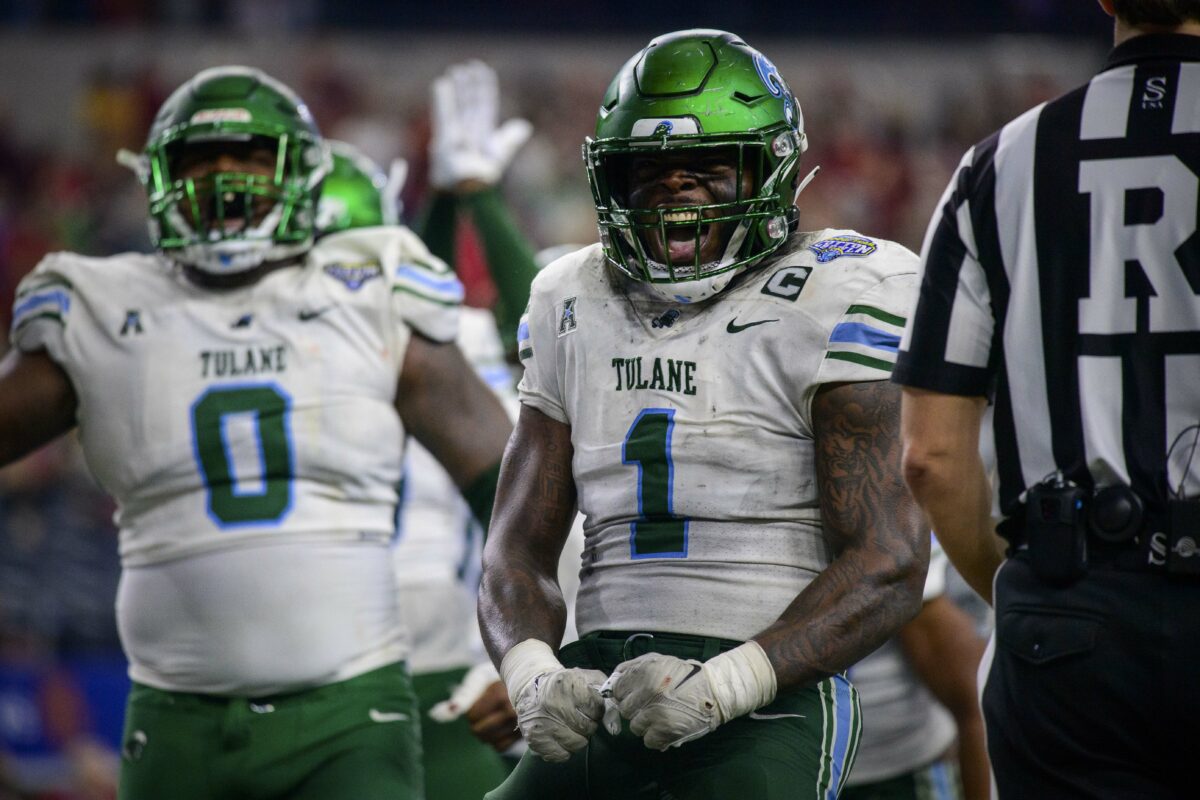 Tulane’s Nick Anderson picked the perfect jersey to celebrate signing with the Saints