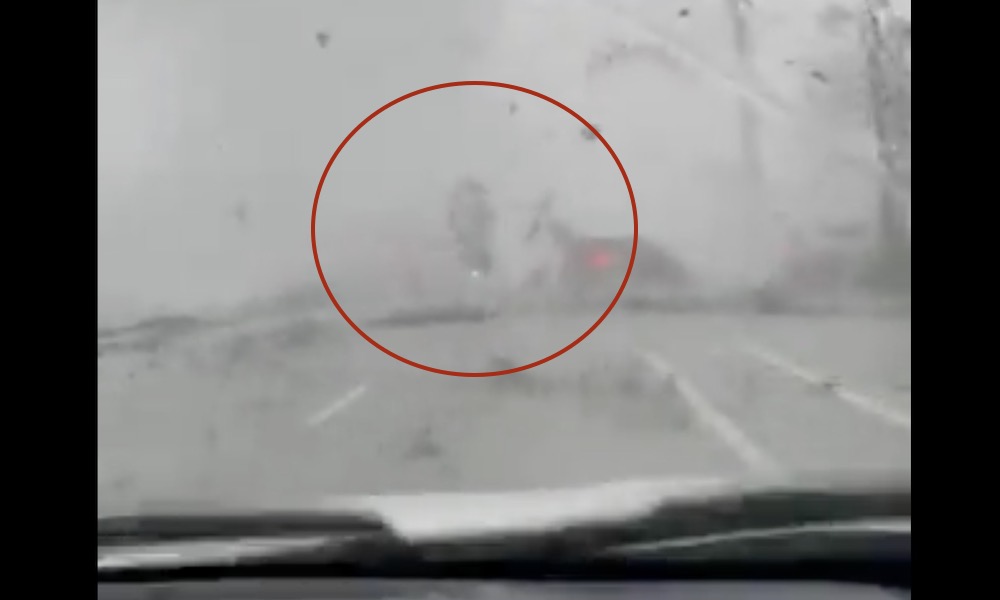 Tornado flips car on Florida highway, motorists watch in awe