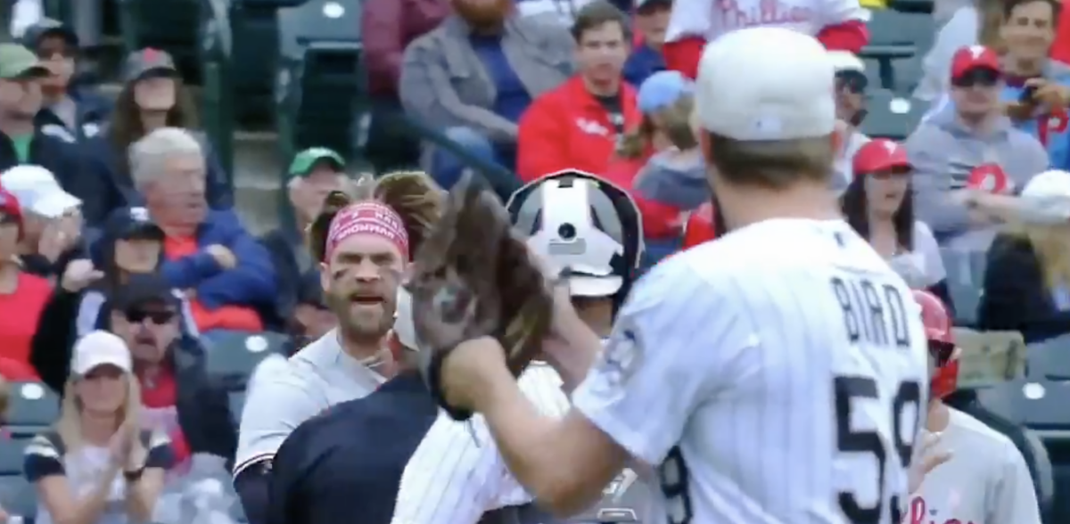 Benches cleared after Rockies pitcher Jake Bird clapped his glove at a furious Bryce Harper