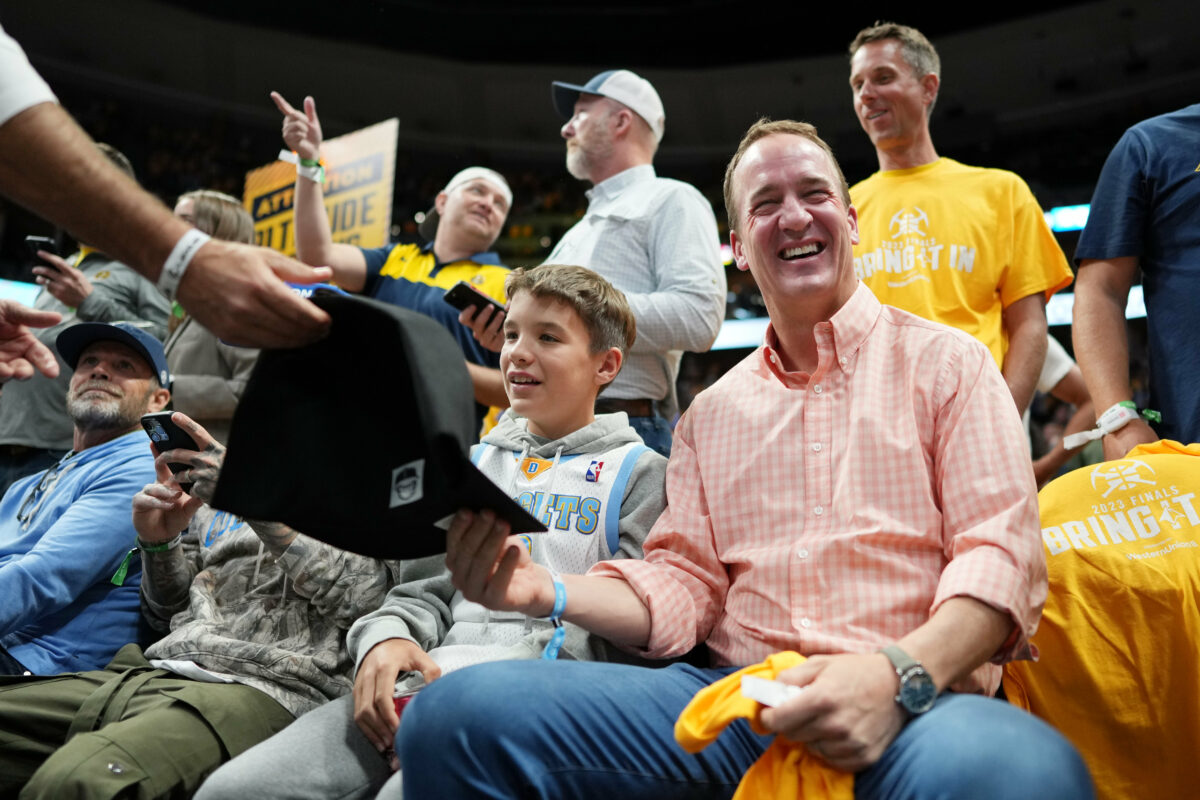 Peyton Manning, Sean Payton and Russell Wilson were at the Nuggets’ win last night