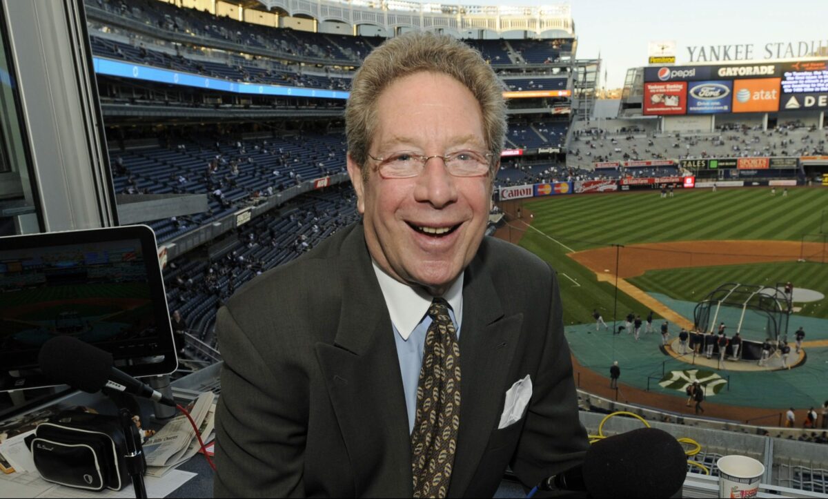 Yankees radio announcer John Sterling valiantly continued his call after getting hit with a foul ball