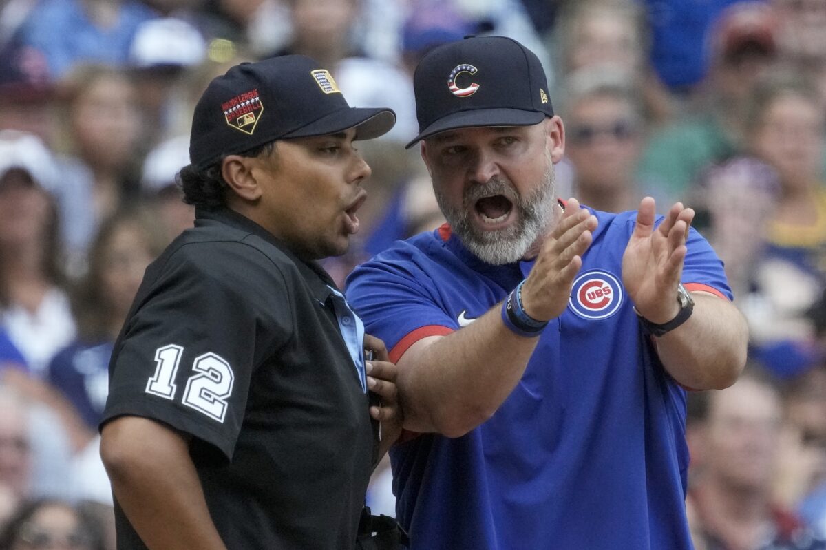 David Ross angrily calls out umps and Brewers for closing their roof with expletive-filled interview