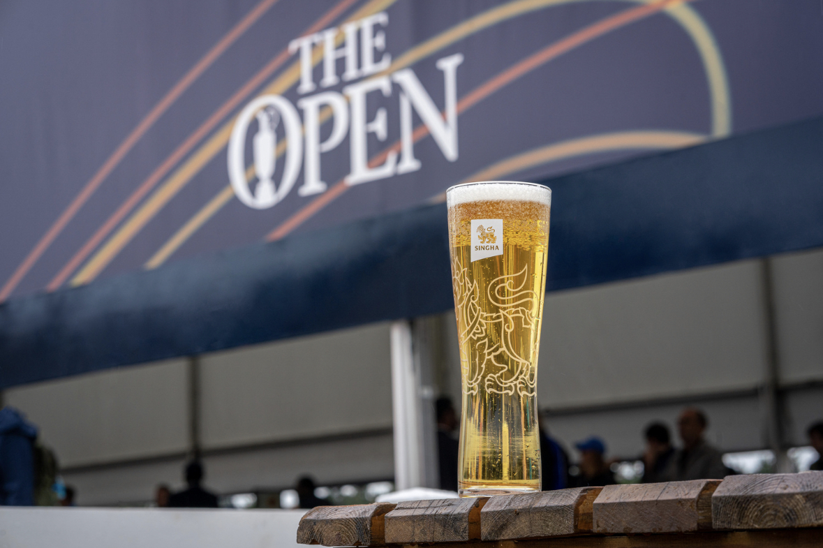 Why is a Thai lager the “official beer of the British Open?” We were wondering the same thing