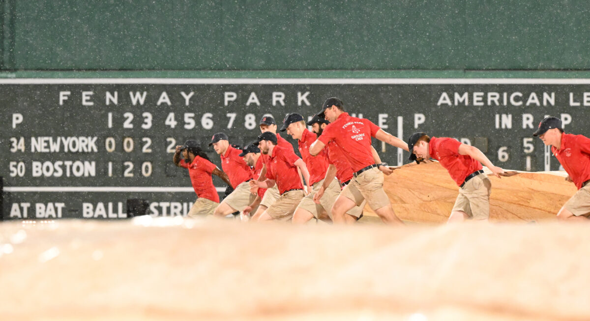 MLB fans were in disbelief after heavy rain flooded the concourses at Fenway Park