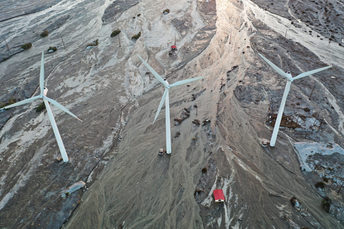 View above Palm Springs’ wind turbines reveal intense flooding from Tropical Storm Hilary