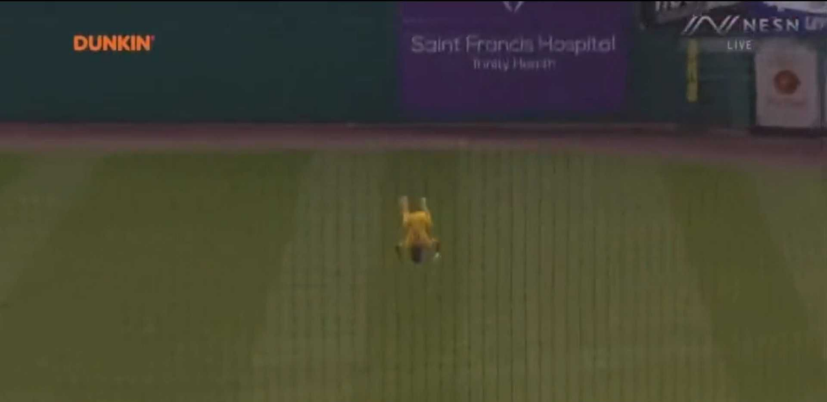 A Savannah Bananas outfielder catching a ball while in mid-backflip is b-a-n-a-n-a-s