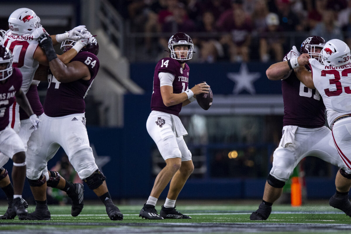 ‘I love my dad. He has done a great job of teaching me, not just how to throw the ball, but how to be a good quarterback.’ Max Johnson speaks during during Texas A&M’s Fall practice Media Day