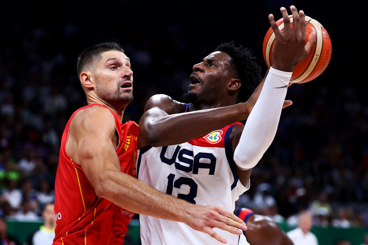 Nikola Vucevic fouls Jaren Jackson Jr and other pictures of the day at the World Cup
