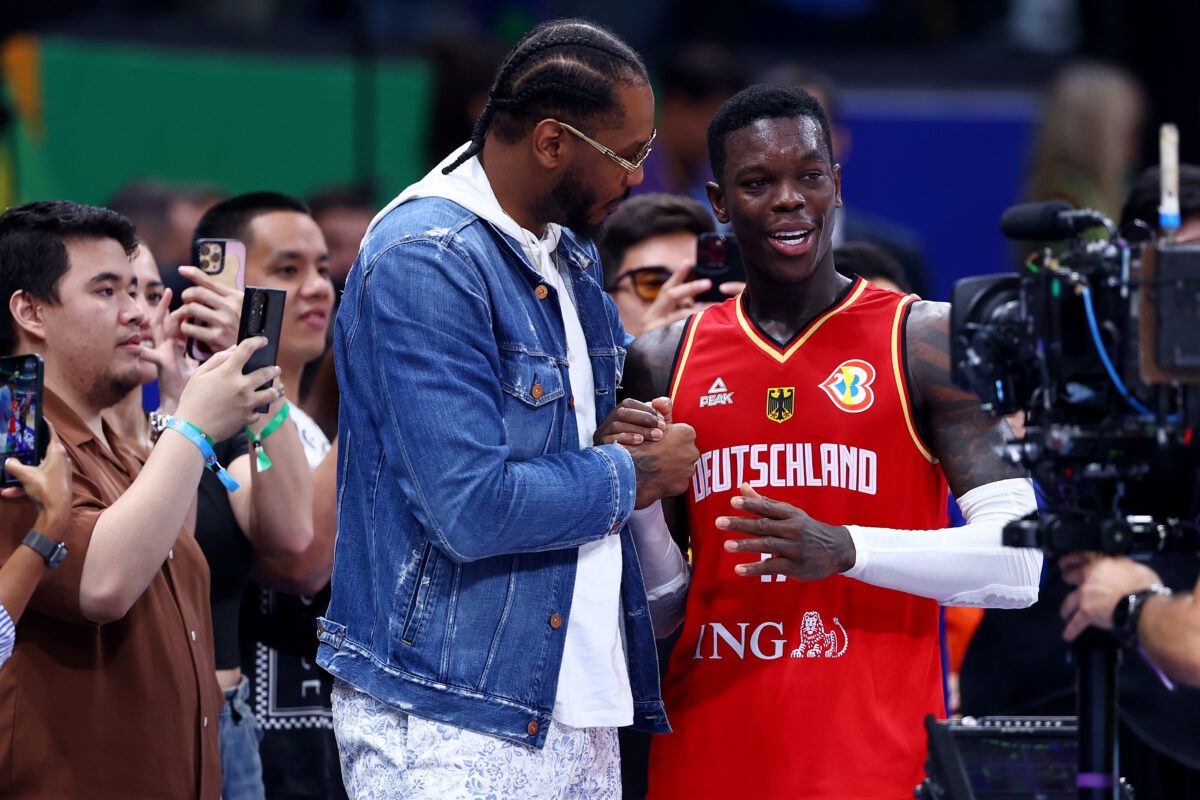 Carmelo Anthony congratulates Dennis Schroeder and other pictures of the day at the World Cup